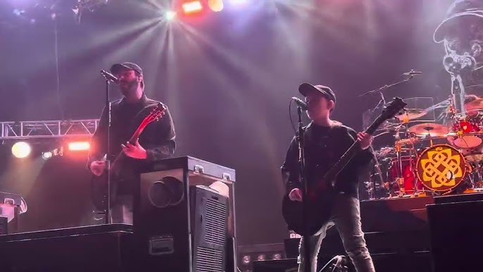 Breaking Benjamin performing on tour